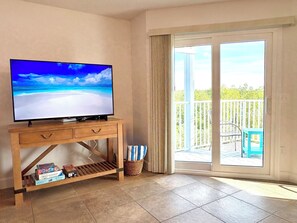 TV, stereo - Private balconies, Walk to Holmes Beach, sleeps 8, access to heated pool (Holmes Beach)