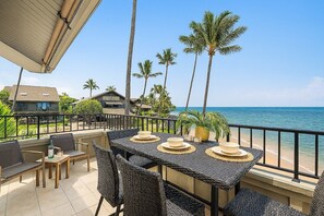 Outdoor dining - Remodeled 2BD Oceanfront Condo w/ Stunning Sunset Views - Kahana Village 20 (Lahaina)