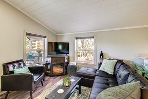 TV, fireplace, books - Traverse City Cabin w/ Nearby Hiking & Lake! (Grawn)