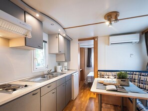 Microwave, highchair - Beautiful apartment in villa for 6 guests with pool, A/C, WIFI and terrace (Grado)