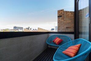 Junior Apartment, Non Smoking, City View | Terrace/patio