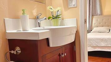 Hair dryer, towels, soap, toilet paper