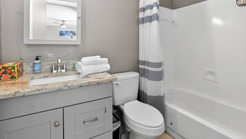 Hair dryer, towels, soap, shampoo