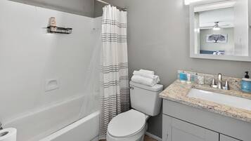 Hair dryer, towels, soap, shampoo