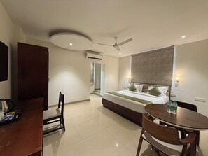 Executive Double Room, City View | In-room safe, desk, laptop workspace, blackout drapes