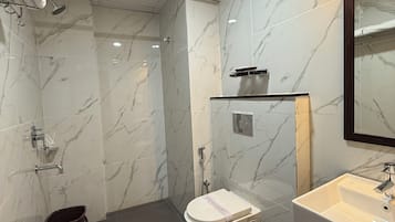 Shower, free toiletries, hair dryer, slippers