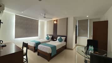 Business Twin Room, City View | In-room safe, desk, laptop workspace, blackout drapes