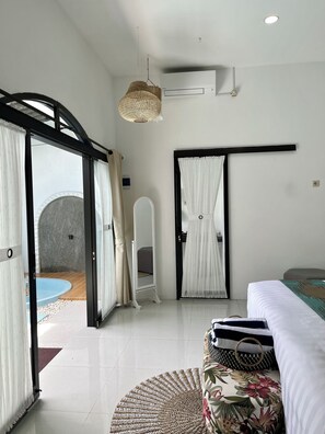 Deluxe Villa, 1 King Bed, Patio, Pool View | Desk, laptop workspace, free WiFi