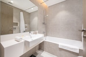 Shower, hair dryer, bidet, towels - Lagoon-Facing 1BR, Minutes from Downtown and Business Bay (Dubai)