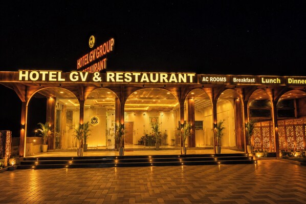 Hotel GV & Restaurant with a signboard indicating AC rooms, breakfast, lunch, and dinner services. - Hotel GV Group and Restaurant (Khatoo)