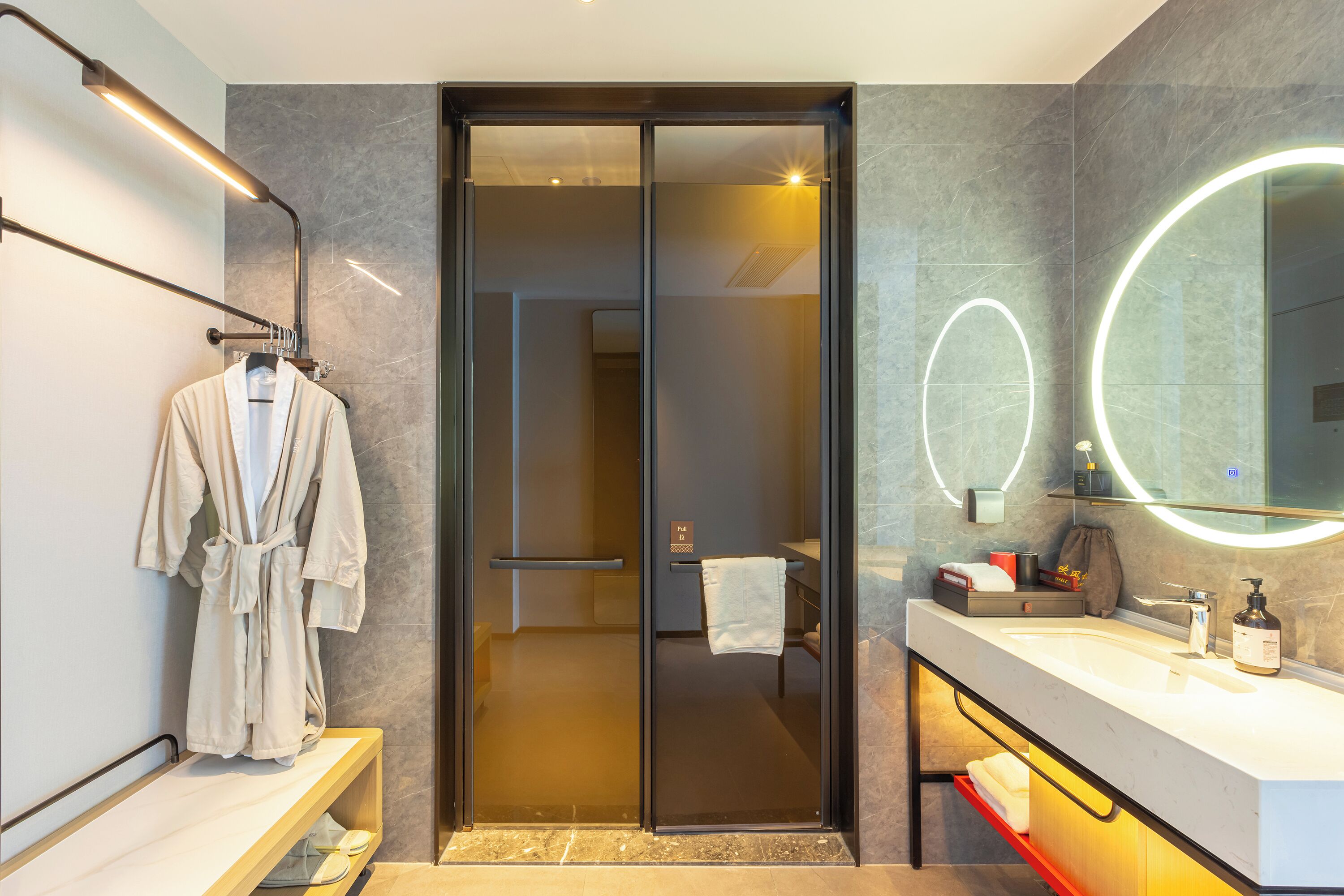 Shower, rainfall showerhead, designer toiletries, hair dryer