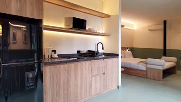 Fridge, microwave, stovetop, coffee/tea maker