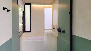 Shower, hair dryer, towels