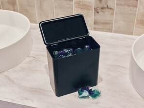 Shower, hair dryer, slippers, towels