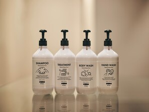 Shower, hair dryer, slippers, towels