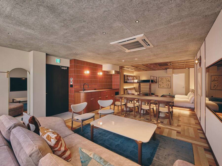 Deluxe Suite, Corner | Blackout drapes, iron/ironing board, WiFi (free), bed sheets