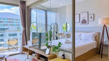 Deluxe Apartment, 2 Bedrooms, Balcony, Courtyard View | Individually decorated, desk, laptop workspace, blackout curtains