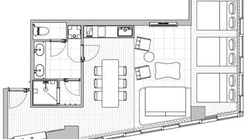 Un plan d’aménagement de chambre d’hôtel comprenant un lit, un coin salon et une kitchenette.