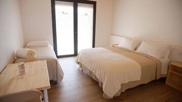 Chambre Triple Confort, patio, vue jardin