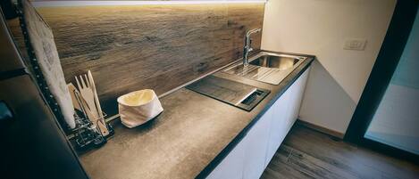 Apartamento luxo, varanda, vista para o jardim | Cozinha privada | Cadeirão de bebê