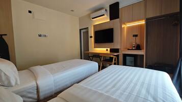 Superior Twin Room, Garden View | In-room safe, desk, laptop workspace, blackout curtains