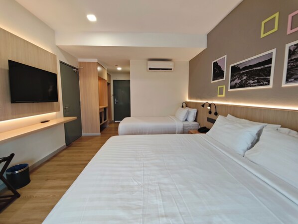 Family Room, Garden View | In-room safe, blackout curtains, iron/ironing board, free WiFi