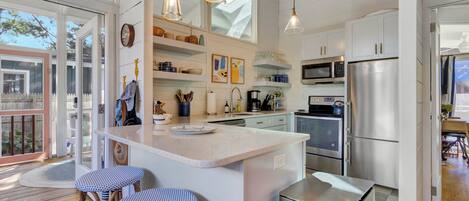 Microwave, stovetop, dishwasher, coffee/tea maker