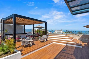 Outdoor dining - Boho 2 BR Condo - Dowtown - Rooftop Pool - Jacuzzi (Puerto Vallarta)