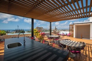 Outdoor dining - Boho 2 BR Condo - Dowtown - Rooftop Pool - Jacuzzi (Puerto Vallarta)
