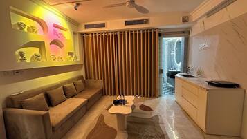 Deluxe Studio, Balcony, City View | Bathroom | Shower, free toiletries, hair dryer, slippers