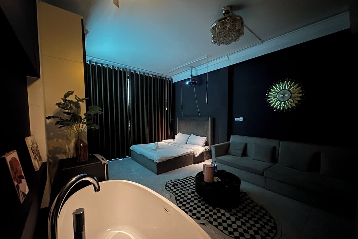 Premium bedding, desk, laptop workspace, free WiFi