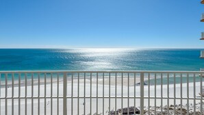 A balcony with a view of a beach and ocean. - Beachfront 4BR, Lazy River/Slide, new complex! (Orange Beach)