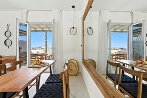 Outdoor dining - Selinofos - a modern seaside home blending comfort and sea views. (Naxos)