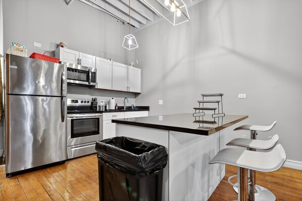 Departamento, 2 habitaciones | Cocina privada | Refrigerador, horno y cafetera y tetera 