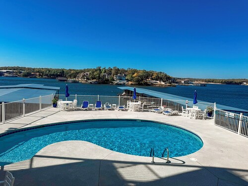 Lakefront 3BR/2BA condo at Lake of the Ozarks across from Dog Days Bar & Grill, home of the Shootout. Sleeps 6 with full kitchen, large deck, pool access, and stunning lake views. Perfect Ozarks vacation rental for families or groups!
