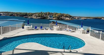 Lakefront 3BR/2BA condo at Lake of the Ozarks across from Dog Days Bar & Grill, home of the Shootout. Sleeps 6 with full kitchen, large deck, pool access, and stunning lake views. Perfect Ozarks vacation rental for families or groups!