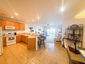 Fridge, microwave, oven, stovetop - Lakefront 3BR/2BA condo at Lake of the Ozarks across from Dog Days Bar & Grill, home of the Shootout. Sleeps 8  with full kitchen, large deck, pool access, and stunning lake views. Perfect Ozarks vacation rental for families or groups! (Osage Beach)