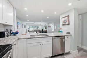 Fridge, microwave, oven, stovetop - Oceanfront Ground-Floor Condo| Patio, Pool & Beach (St. Augustine)