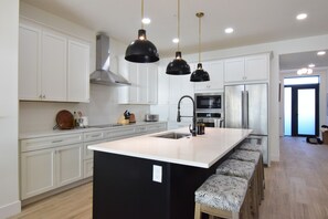 Microwave, oven, stovetop, dishwasher - NEW 3BR Riverfront Luxury Condo with Private Beach Access (Melbourne Beach)