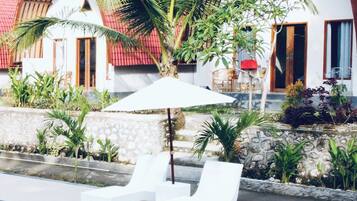 Outdoor pool, open 9:00 AM to 9:00 PM, pool umbrellas, sun loungers