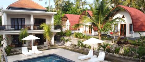 Outdoor pool, open 9:00 AM to 9:00 PM, pool umbrellas, sun loungers