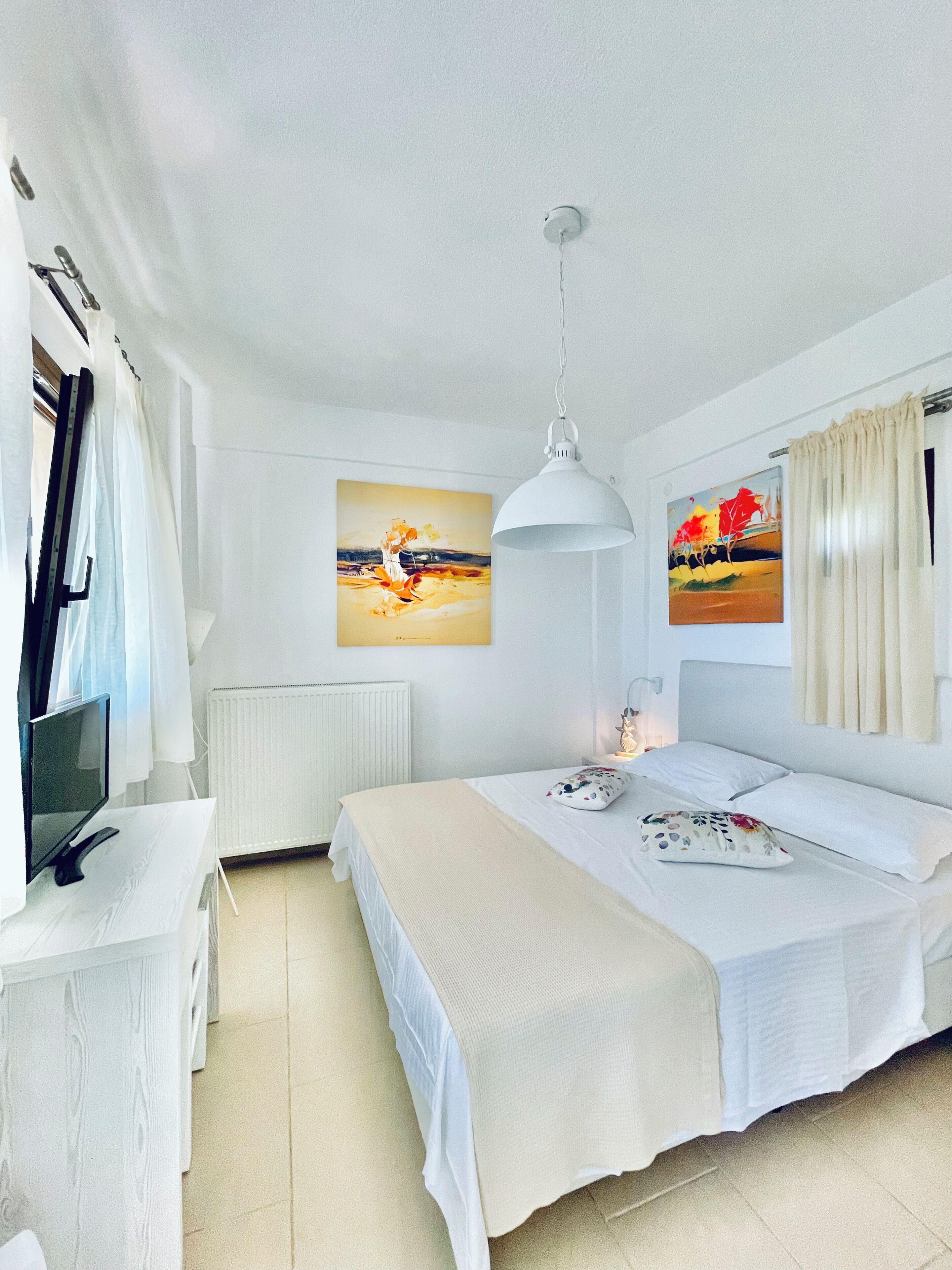 Family Room, Sea View | In-room safe, soundproofing, iron/ironing board, free WiFi