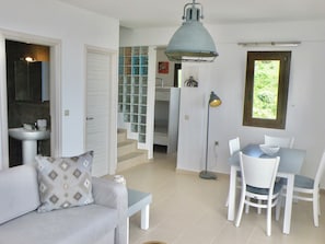 Family Room, Sea View | Living area - Koumaros ApartHotel (Kassandra)