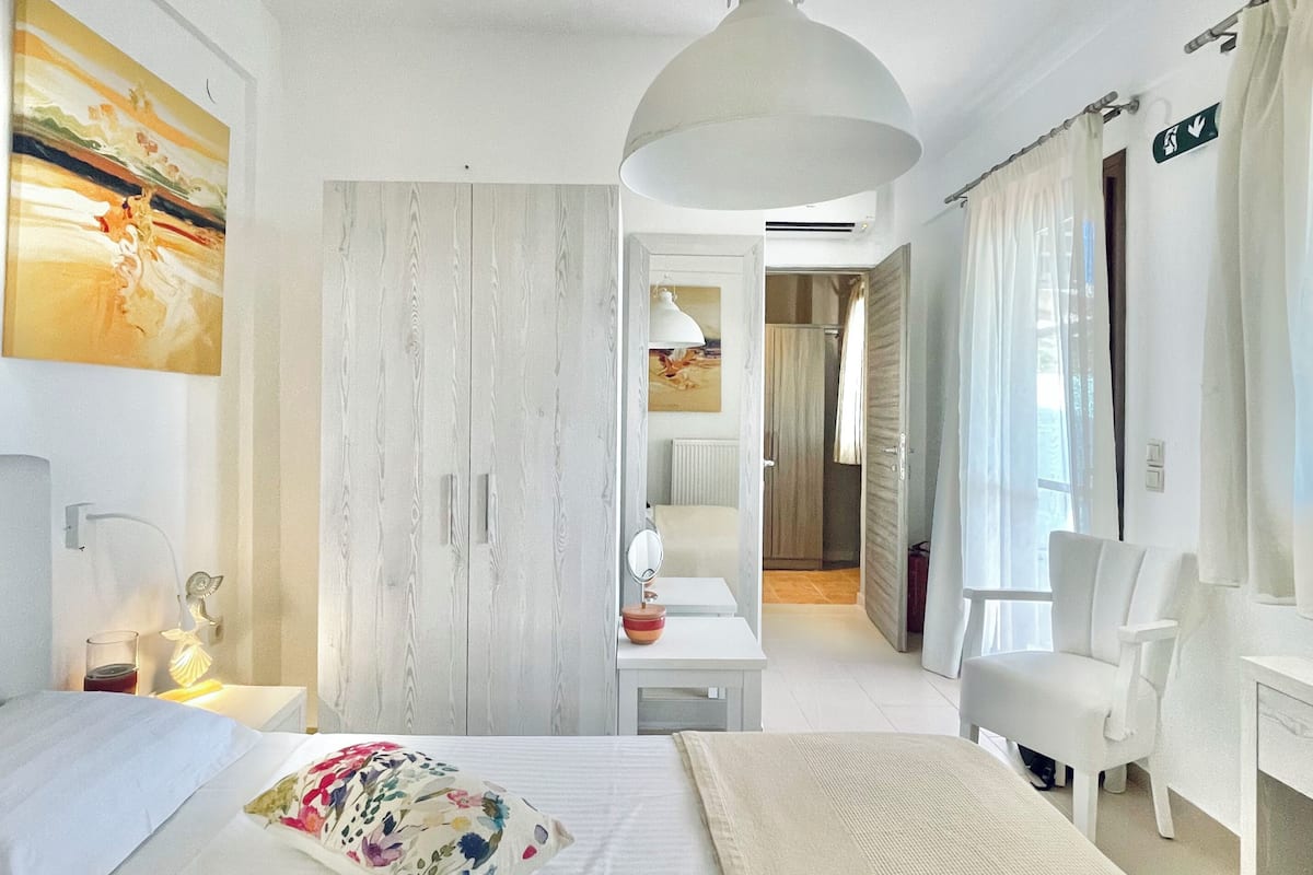 Family Room, Sea View | In-room safe, soundproofing, iron/ironing board, free WiFi