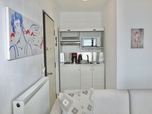Family Room, Sea View | Living area - Koumaros ApartHotel (Kassandra)