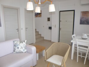 Chambre Familiale, vue mer | Coin séjour