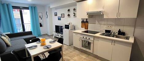 Fridge, microwave, stovetop, coffee/tea maker