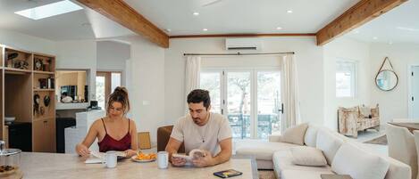 TV, fireplace, books