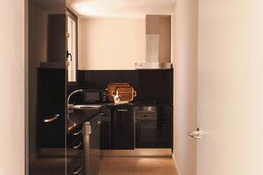 Fridge, microwave, oven, stovetop - WASI - Two Bedroom Apartment (Barcelona)