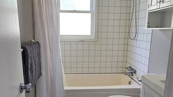 Hair dryer, towels, soap, shampoo
